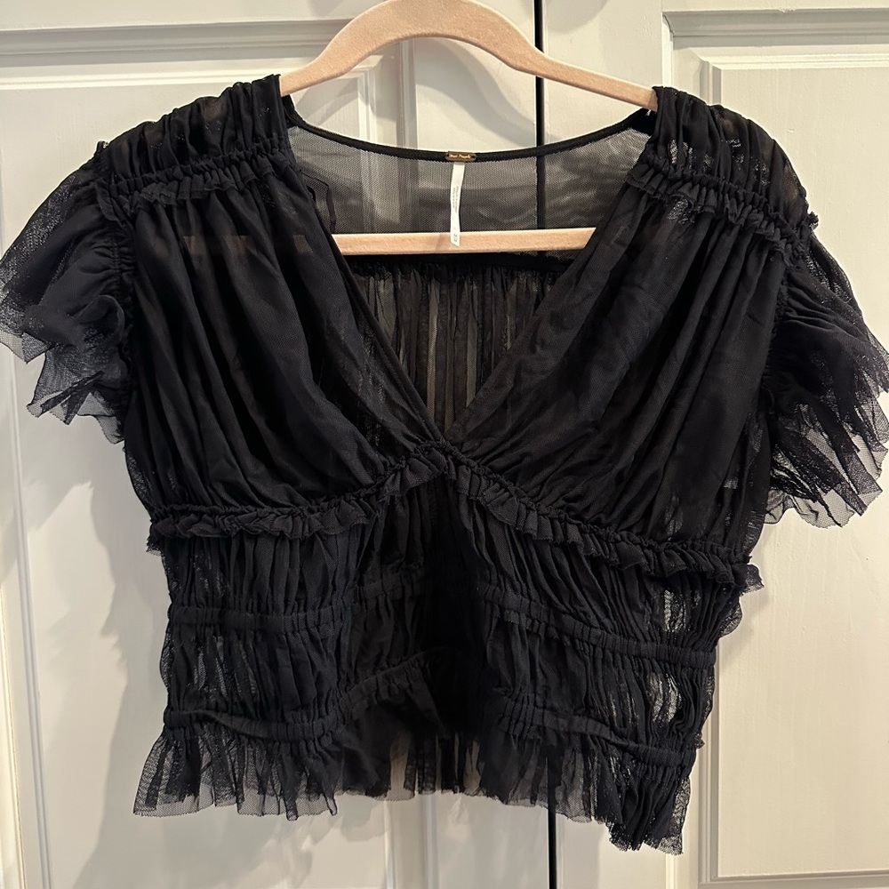 Free People black mesh top. Size M Lighlty worn - great condition.